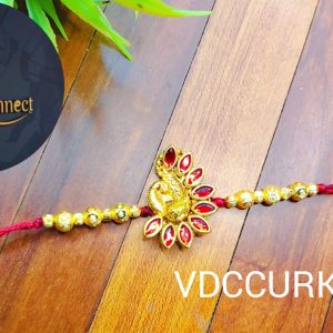 Peacock pendant Rakhi with kundans